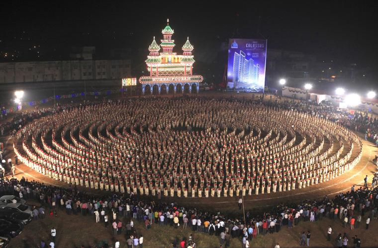 The record for the largest kaikottikali dance is 2,639 participants achieved by the Mumbai Pooram Foundation in Mumbai, India in November to celebrate Guinness World Records Day 2012. 
Kaikottikali , or thiruvathirakali, is the most famous group-dances of the women of Kerala .This form of dance has generally eight to ten women dancing in a symmetrical form with rhythm. The dancers move in a circular pattern, accompanied by rhythmic clapping of the hands, to the tune of the song (Thiruvathira pattu).  They move in circular motion, clockwise and at times anticlockwise, with all performers bend sideways, with theirs arms coming together in graceful gestures, upwards and downwards and to either side, in order to clap. A dance of this scale is unprecedented.